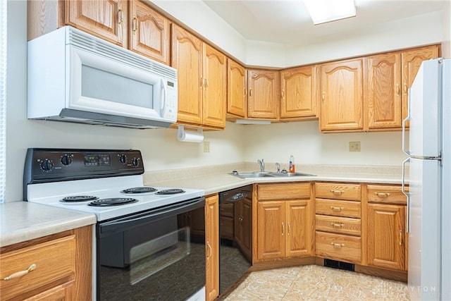 1716 Pershing Blvd, Dayton, OH 45420 - kitchen with white appliances, light countertops, and light tile patterned flooring