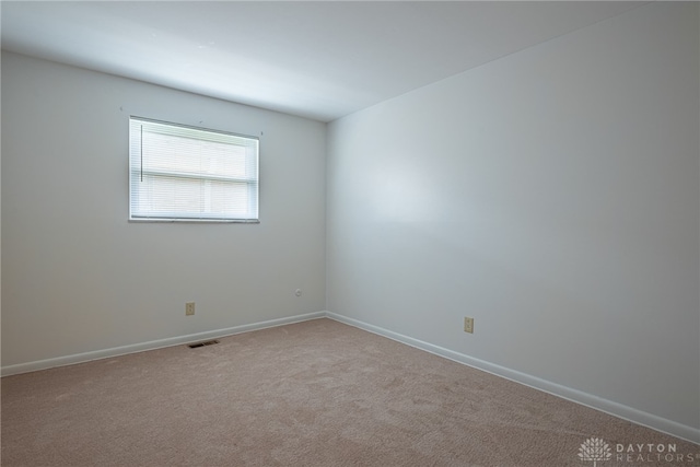 1716 Pershing Blvd, Dayton, OH 45420 - carpeted empty room featuring baseboards