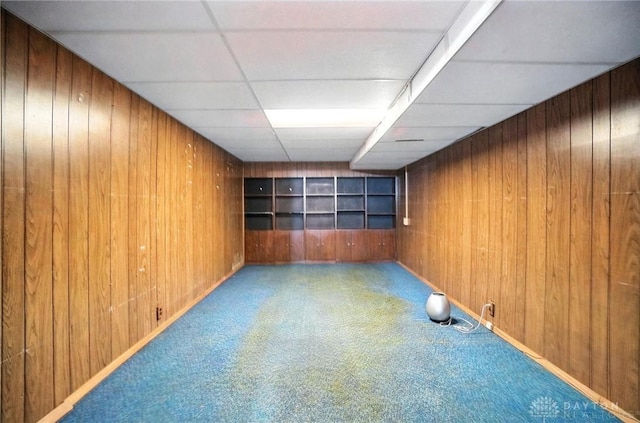 3811 Berryleaf Ct, Dayton, OH 45424 - empty room with carpet flooring, wood walls, and built in shelves