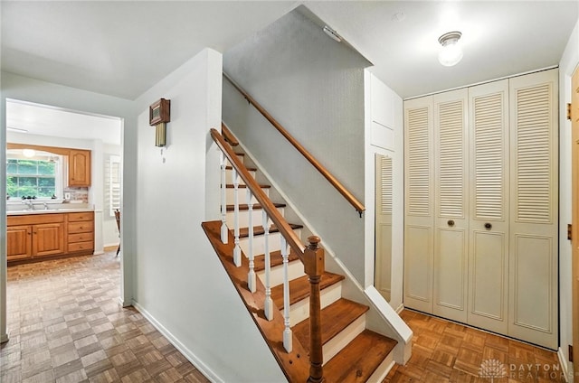 3811 Berryleaf Ct, Dayton, OH 45424 - stairway featuring baseboards