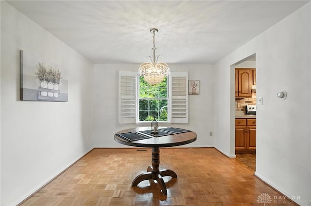 3811 Berryleaf Ct, Dayton, OH 45424 - dining space featuring a chandelier and baseboards