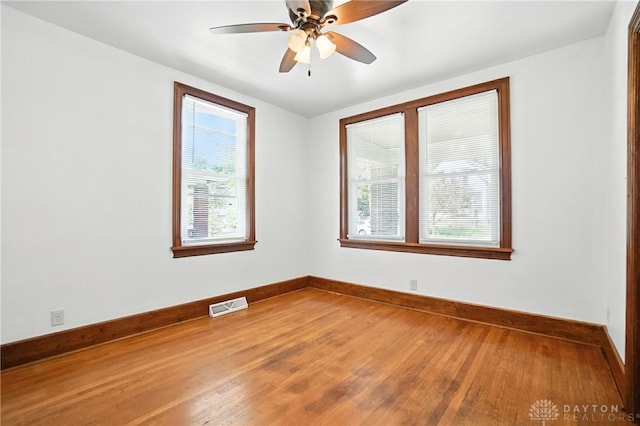 7336 Maple Ave, Cincinnati, OH 45231 - empty room with wood finished floors and ceiling fan