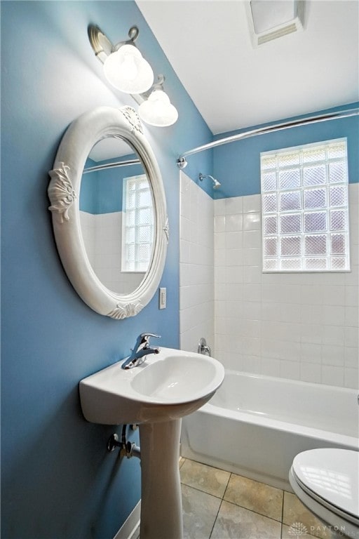 7336 Maple Ave, Cincinnati, OH 45231 - full bath with tile patterned floors, bathtub / shower combination, and plenty of natural light