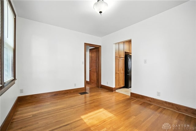 7336 Maple Ave, Cincinnati, OH 45231 - empty room with baseboards and light wood-type flooring