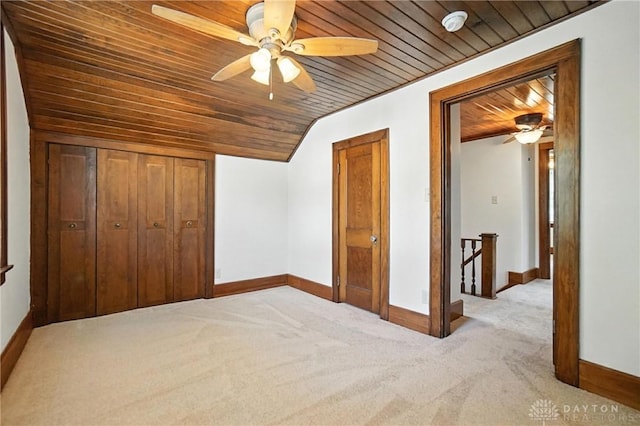 7336 Maple Ave, Cincinnati, OH 45231 - unfurnished bedroom featuring wooden ceiling, lofted ceiling, carpet floors, a ceiling fan, and a closet