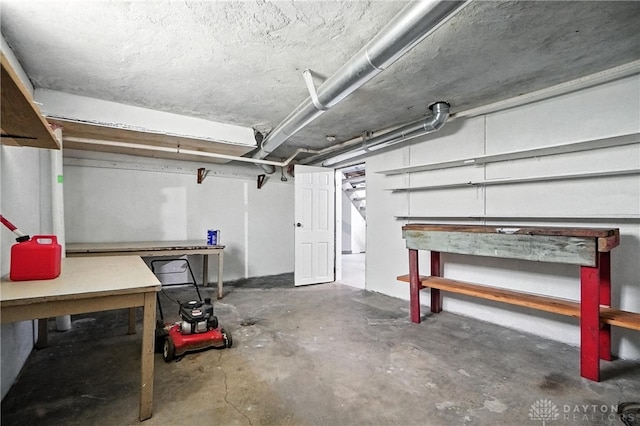 7336 Maple Ave, Cincinnati, OH 45231 - unfinished basement with a workshop area