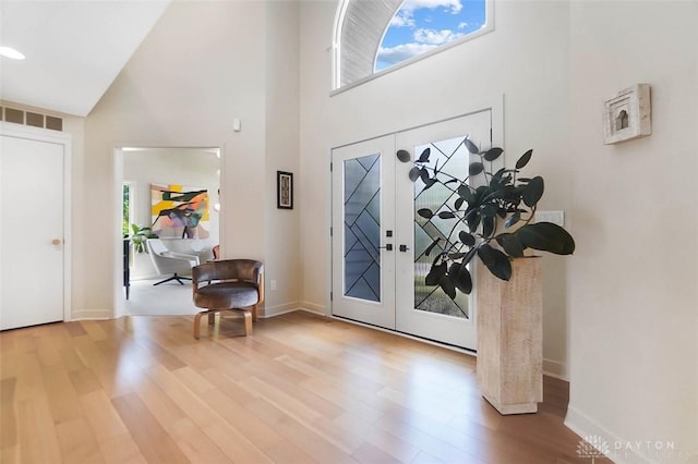 525 Heatherwoode Cir, Springboro, OH 45066 - entrance foyer featuring a towering ceiling and wood finished floors