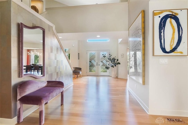 525 Heatherwoode Cir, Springboro, OH 45066 - entrance foyer with wood finished floors and a chandelier