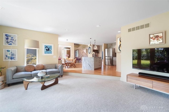 525 Heatherwoode Cir, Springboro, OH 45066 - living area with light colored carpet and recessed lighting