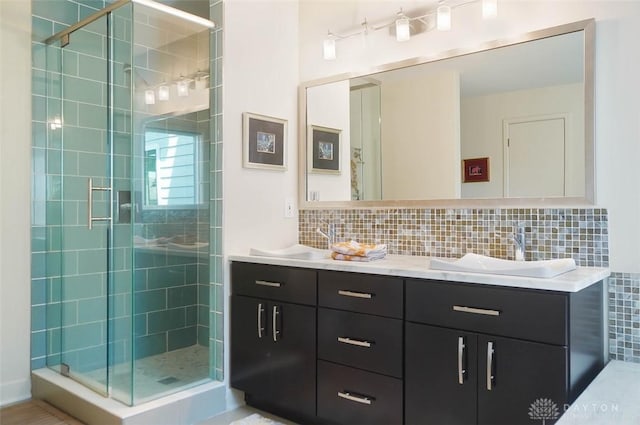 525 Heatherwoode Cir, Springboro, OH 45066 - full bathroom with double vanity, a stall shower, and tasteful backsplash