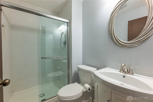 3072 Fowler Rd, Springfield, OH 45502 - full bath featuring a stall shower, vanity, and a textured ceiling
