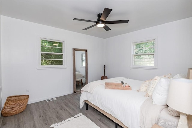 4651 Christopher Ave, Dayton, OH 45406 - bedroom with wood finished floors and ceiling fan