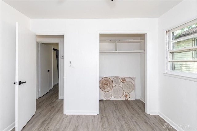 4651 Christopher Ave, Dayton, OH 45406 - unfurnished bedroom featuring light wood-type flooring and a closet