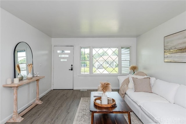 4651 Christopher Ave, Dayton, OH 45406 - living area featuring wood finished floors and plenty of natural light