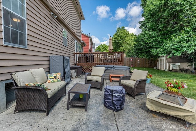 274 Tamarack Trl, Springboro, OH 45066 - view of patio with an outdoor hangout area, a storage unit, and a wooden deck