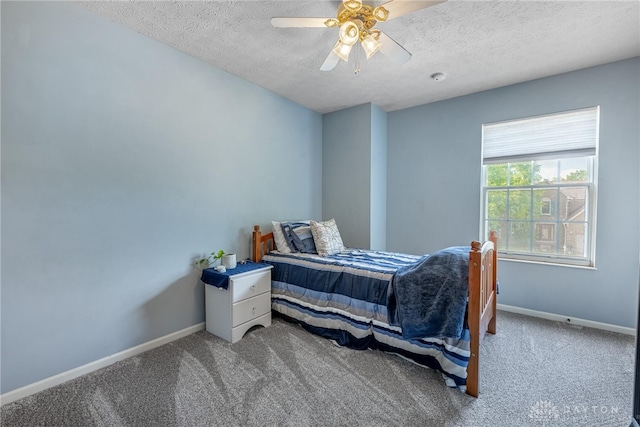 274 Tamarack Trl, Springboro, OH 45066 - bedroom featuring a textured ceiling, carpet flooring, and ceiling fan