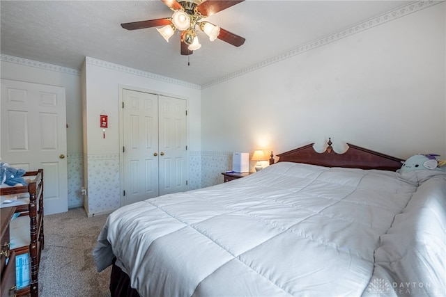 274 Tamarack Trl, Springboro, OH 45066 - carpeted bedroom with wainscoting, a closet, and a ceiling fan