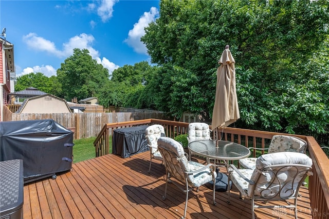274 Tamarack Trl, Springboro, OH 45066 - wooden deck featuring a fenced backyard, outdoor dining area, and grilling area