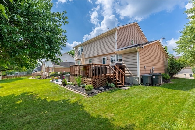 274 Tamarack Trl, Springboro, OH 45066 - back of house with a deck and a lawn