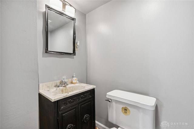 1220 Bookwalter Ave, New Carlisle, OH 45344 - half bath featuring vanity and toilet