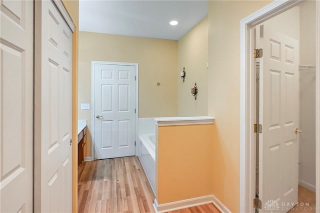 6963 Gentry Ln, Mason, OH 45040 - hall with light wood finished floors and recessed lighting