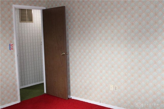 461 Poplar Grove Dr, Vandalia, OH 45377 - carpeted empty room featuring wallpapered walls