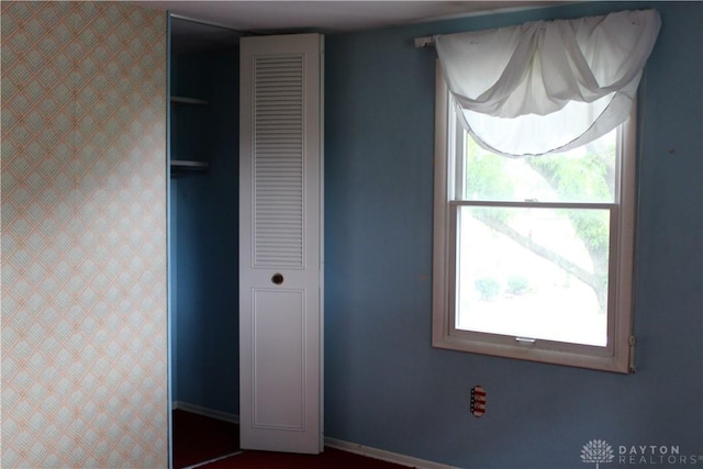 461 Poplar Grove Dr, Vandalia, OH 45377 - unfurnished bedroom featuring baseboards and a closet
