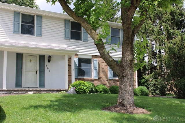 461 Poplar Grove Dr, Vandalia, OH 45377 - view of front of home with a front yard and brick siding