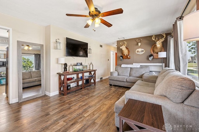 120 N Grant St, Covington, OH 45318 - living room featuring ceiling fan, wood finished floors, and healthy amount of natural light