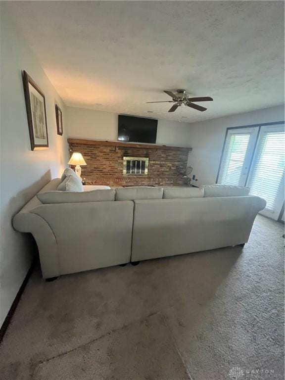 4220 Pleasanton Rd, Englewood, OH 45322 - living area with carpet flooring and ceiling fan