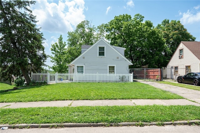 3521 E 4th St, Dayton, OH 45403 - view of front of house featuring concrete driveway and a fenced front yard