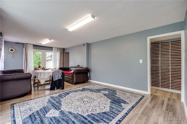 3521 E 4th St, Dayton, OH 45403 - living area with wood finished floors and baseboards