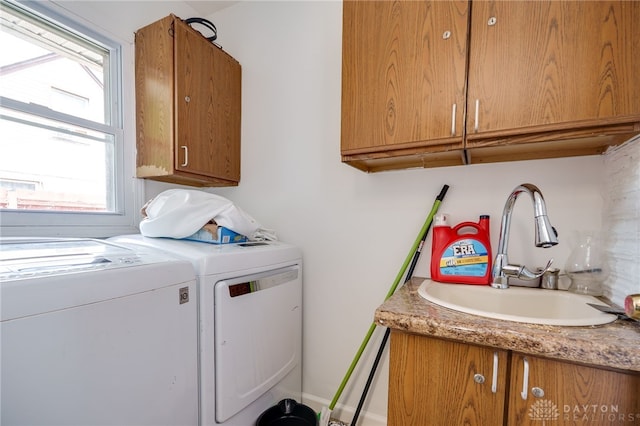 3521 E 4th St, Dayton, OH 45403 - washroom featuring washing machine and dryer and cabinet space