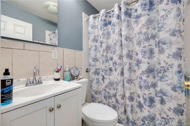 3521 E 4th St, Dayton, OH 45403 - bathroom featuring tile walls, vanity, and a shower with shower curtain