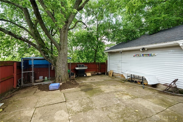 3521 E 4th St, Dayton, OH 45403 - fenced backyard with a patio area and a hot tub