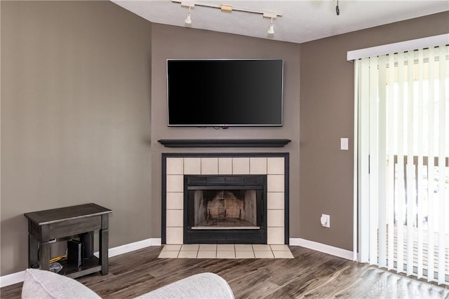 6600 Green Branch Dr Unit 5, Dayton, OH 45459 - detailed view of wood finished floors, a fireplace, and track lighting