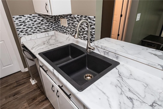 6600 Green Branch Dr Unit 5, Dayton, OH 45459 - kitchen featuring white cabinetry, backsplash, dark wood-type flooring, and light stone countertops