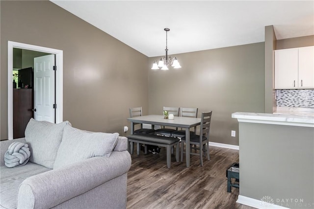 6600 Green Branch Dr Unit 5, Dayton, OH 45459 - dining room with a chandelier, dark wood finished floors, and vaulted ceiling
