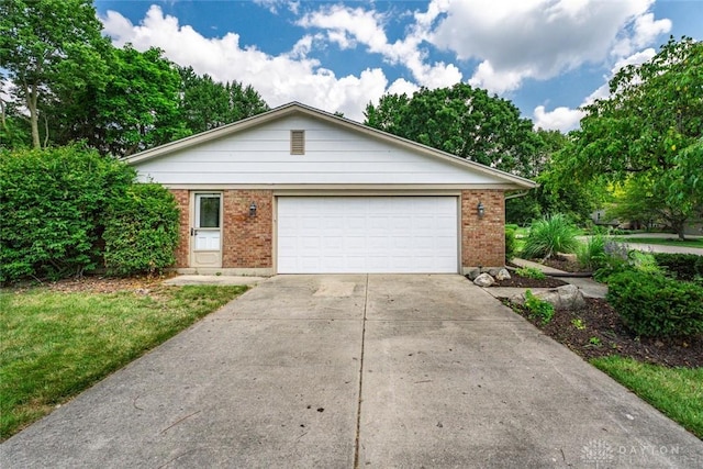 1695 Winterstone Ct, Washington Twp, OH 45458 - single story home with brick siding, concrete driveway, and an attached garage
