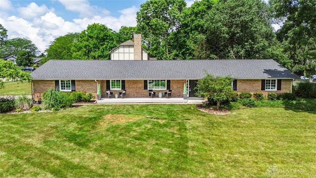 1695 Winterstone Ct, Washington Twp, OH 45458 - single story home with a front yard, brick siding, a chimney, and a shingled roof