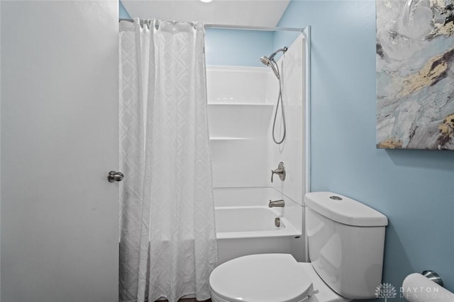 1695 Winterstone Ct, Washington Twp, OH 45458 - bathroom featuring shower / bathtub combination with curtain and toilet