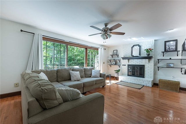 1908 Court Donegal, Middletown, OH 45042 - living room featuring ceiling fan, wood finished floors, and a fireplace