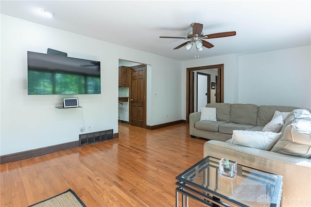 1908 Court Donegal, Middletown, OH 45042 - living room featuring light wood-style flooring and a ceiling fan