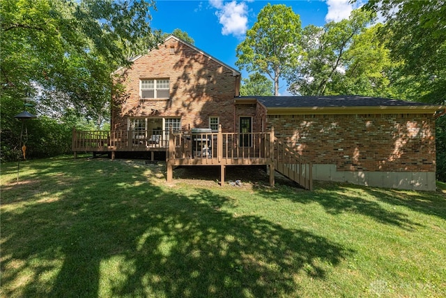 1908 Court Donegal, Middletown, OH 45042 - back of property with brick siding, a yard, a wooden deck, and stairs