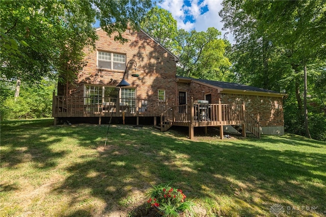 1908 Court Donegal, Middletown, OH 45042 - back of property featuring brick siding, a lawn, a deck, and stairway