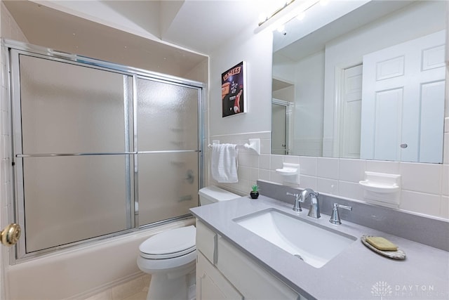 1908 Court Donegal, Middletown, OH 45042 - full bath featuring vanity, combined bath / shower with glass door, and tile walls