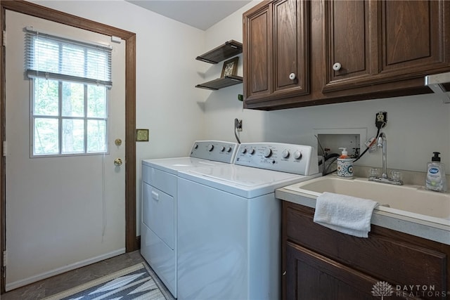 1908 Court Donegal, Middletown, OH 45042 - laundry area featuring separate washer and dryer and cabinet space