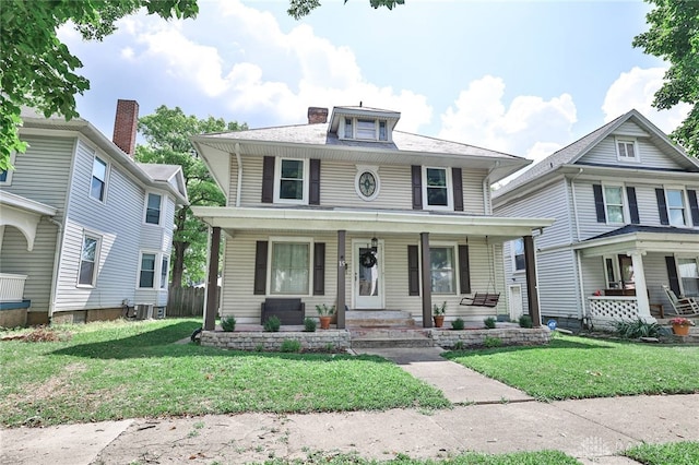 15 Harrison St, Middletown, OH 45042 - american foursquare style home featuring covered porch and a front yard
