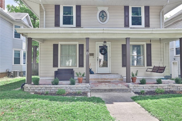 15 Harrison St, Middletown, OH 45042 - view of front of property featuring covered porch and a front yard