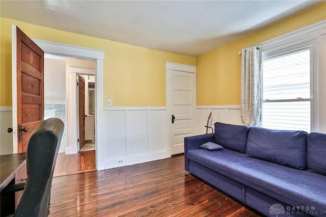 15 Harrison St, Middletown, OH 45042 - living area featuring dark wood-style flooring, wainscoting, and an office area